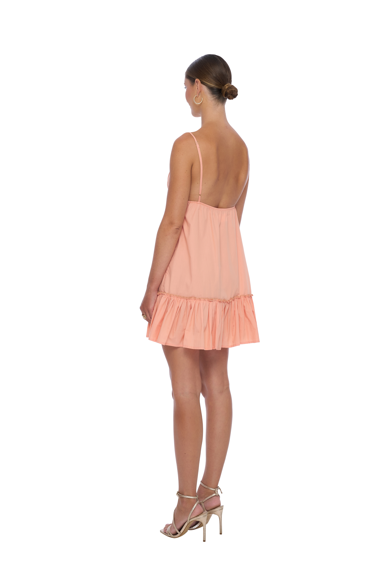 Back View: Cosmo Mini Dress in Peach - Babydoll style mini dress made from premium cotton poplin fabric with adjustable straps for a comfortable, flattering fit.