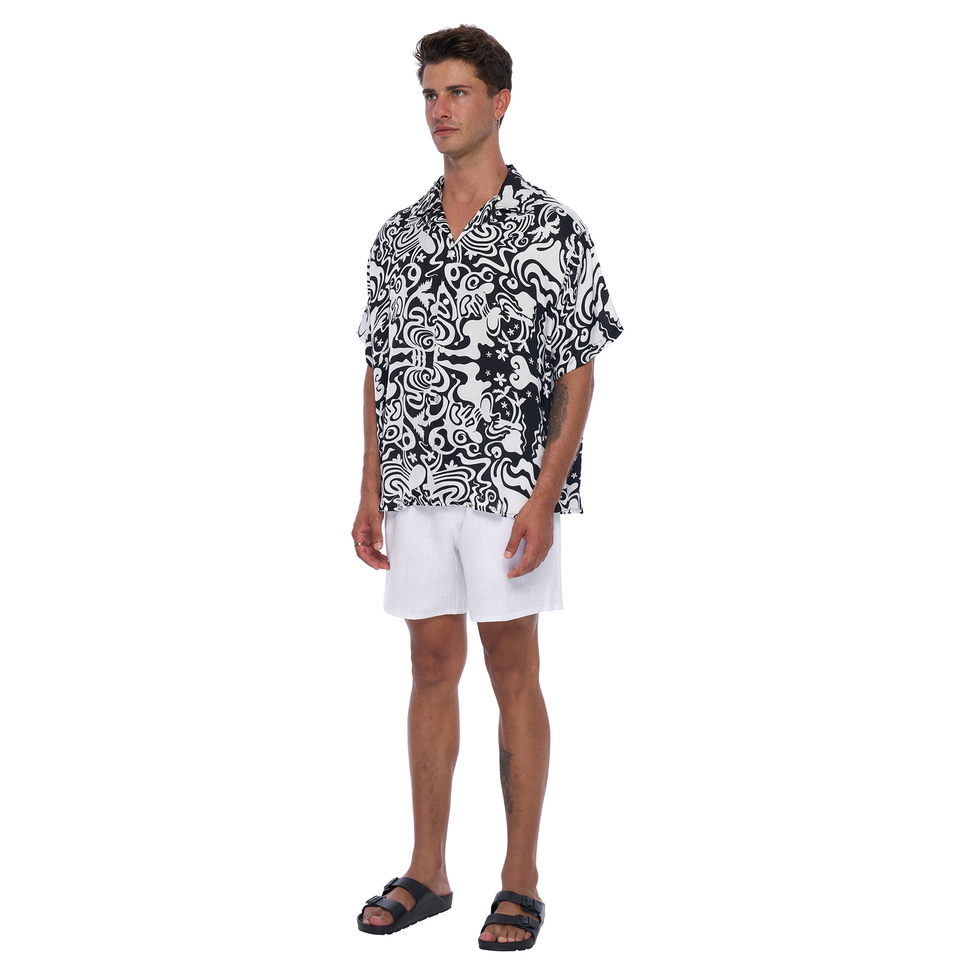 Side View: Kaya Men's Satin Shirt in Black and White abstract print - Relaxed fit shirt made from EcoVero Satin Fabric offering a stylish , sustainable design. 