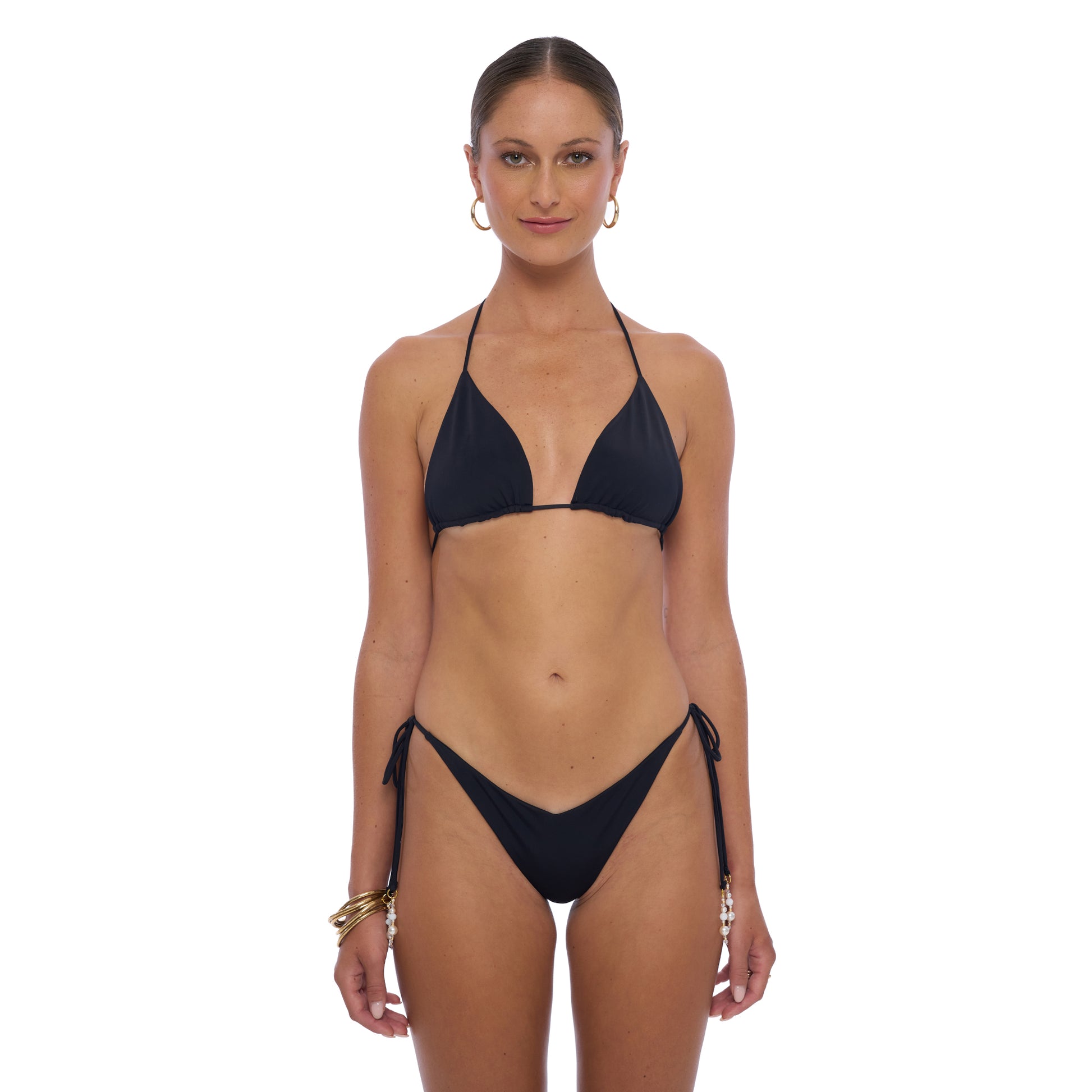 Wave Bikini Bottom - Drawstring style with cheeky cut and front V-shape detail, made from recycled Econyl fabric, featuring beading elements on the drawstring for a flattering ,modern look. 