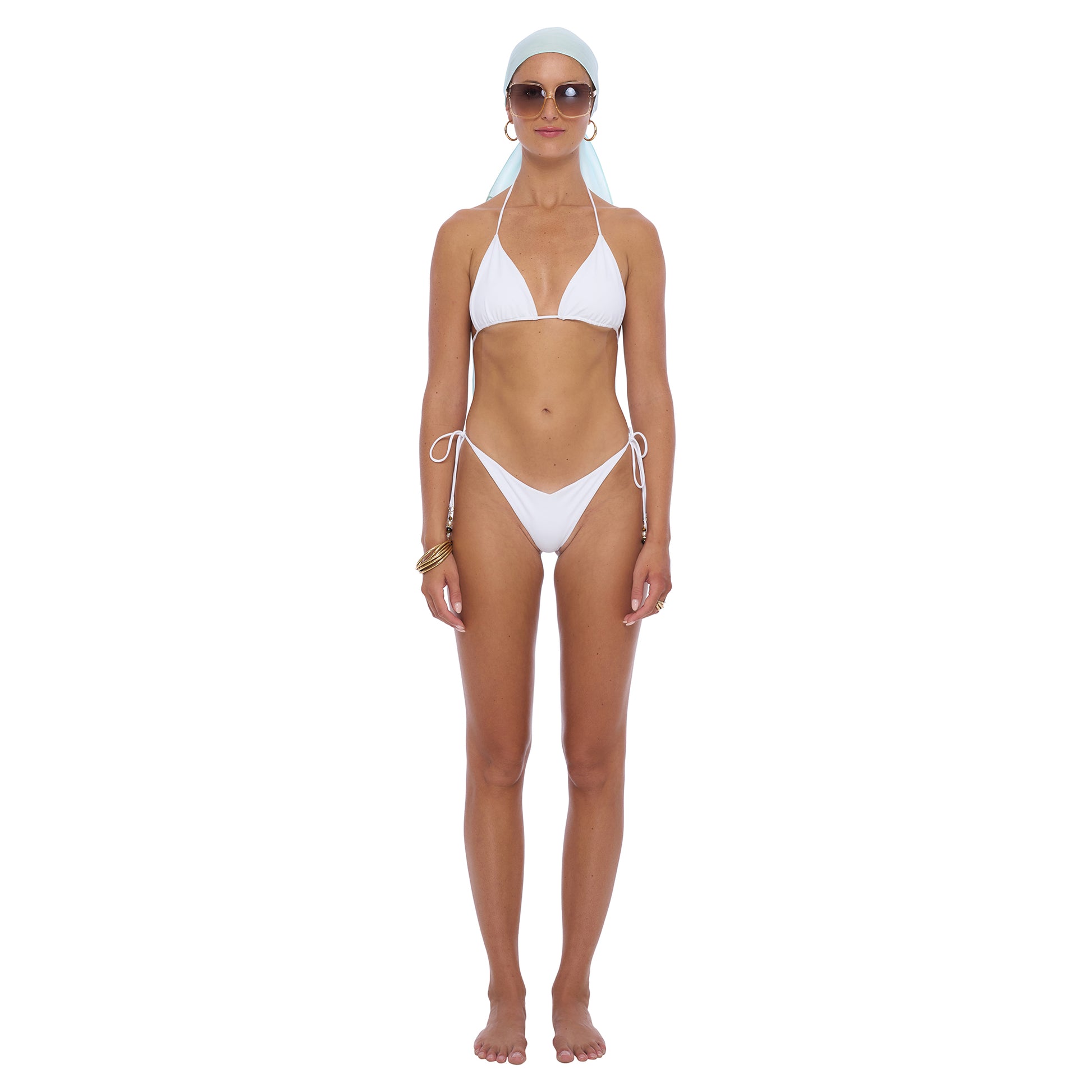 Wave Bikini Bottom - Drawstring style with cheeky cut and front V-shape detail, made from recycled Econyl fabric, featuring beading elements on the drawstring for a flattering ,modern look. 