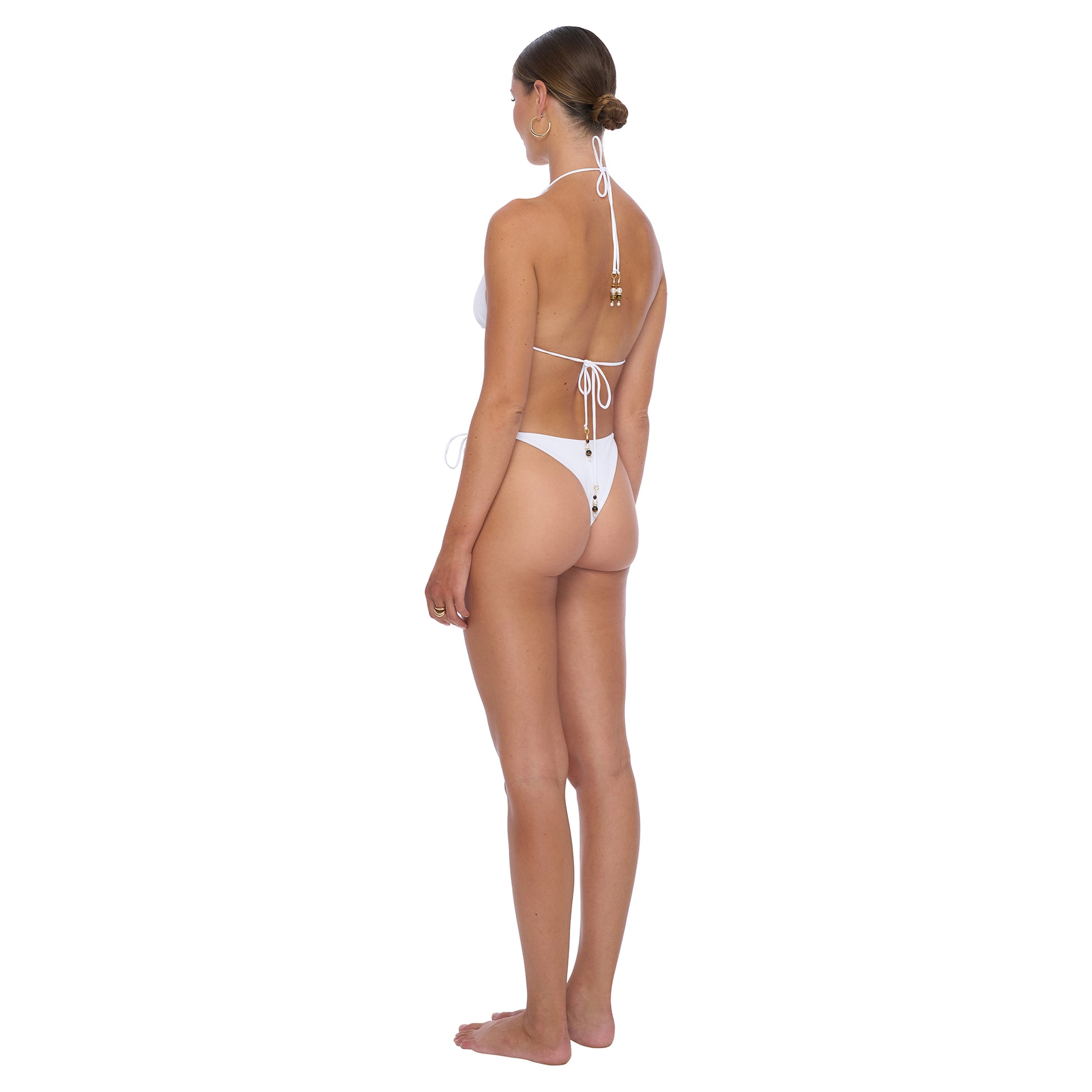Wave Bikini Bottom - Drawstring style with cheeky cut and front V-shape detail, made from recycled Econyl fabric, featuring beading elements on the drawstring for a flattering ,modern look. 